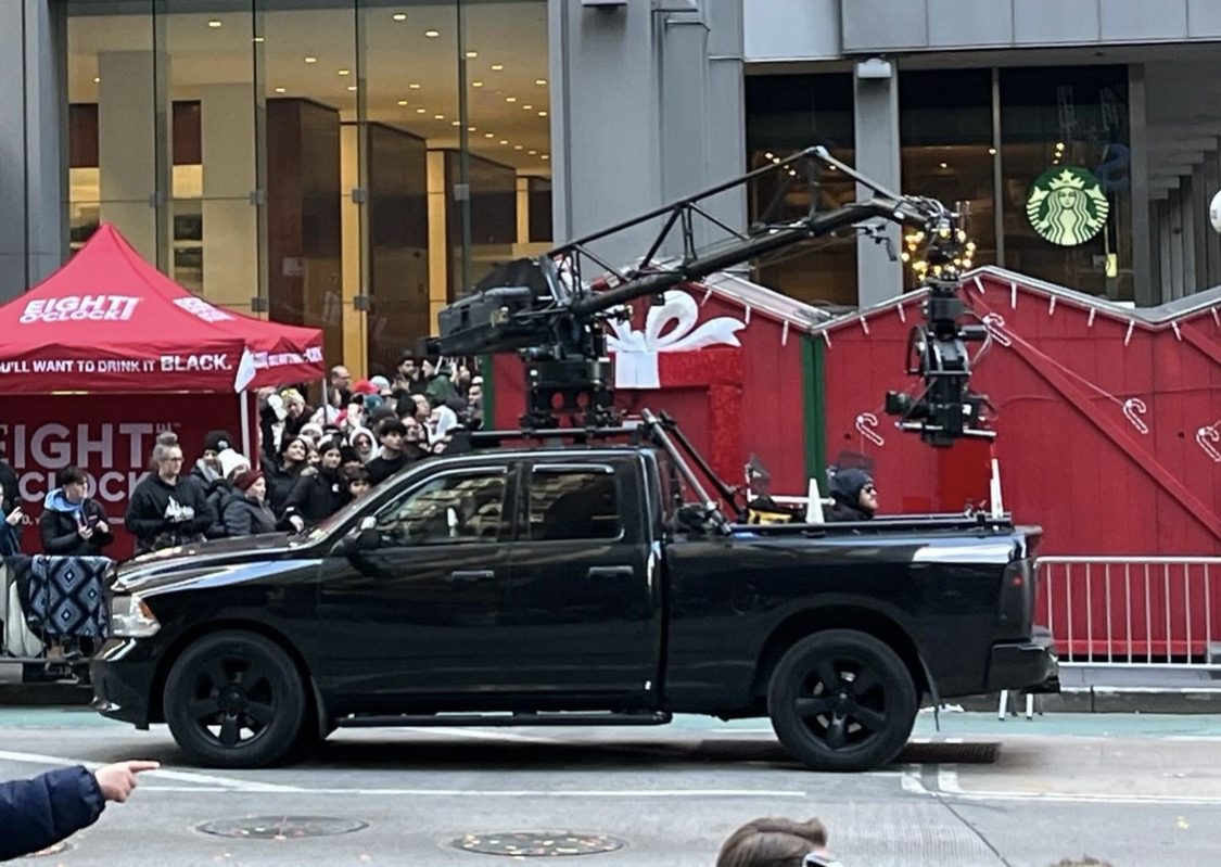 Camera crane rig on a parade route